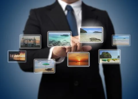 Business man pushing virtual screen with different images of tropical sea , a Stock Illustration
