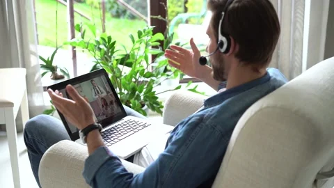 Business man remote worker video conferencing boss and colleagues by online call Video stock 155331886