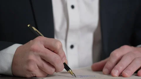 Business man signing contract while sitting at desk in office, close-up Stock Footage 288186712
