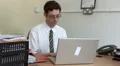 Business man sitting at computer HD Footage