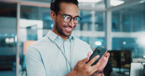 Business man, smile and programmer with mobile in office for software Stock Footage 309060521