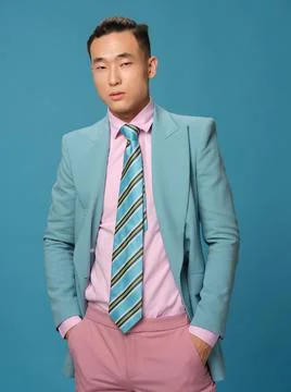 Business man in a suit basic shirt self-confidence official blue background Stock Photos