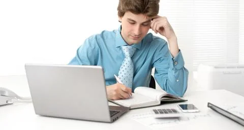 Business man taking notes Stock Photos