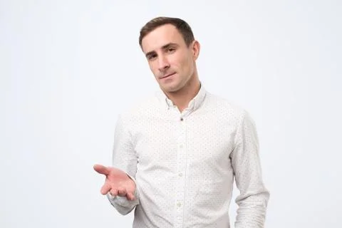 Business man talking during presentation and using hand gestures trying to co Stock Photos