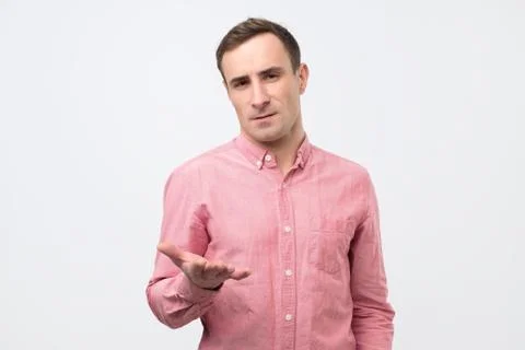 Business man talking during presentation and using hand gestures trying to co Stock Photos