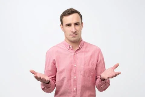 Business man talking during presentation and using hand gestures trying to co Stock Photos