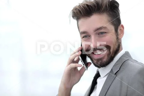 Business man talking on mobile phone Stock Photos