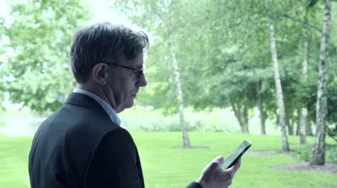 Business man talking on phone Stock Footage 59387001