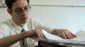 business man talking on two phones HD Footage