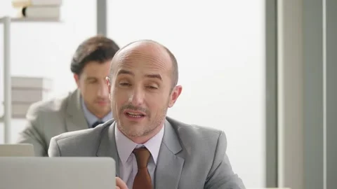 Business man talking to a web camera conference camera  Stock Footage 160265074