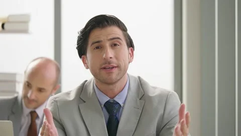 Business man talking to a web camera conference camera  Stock Footage 160265087