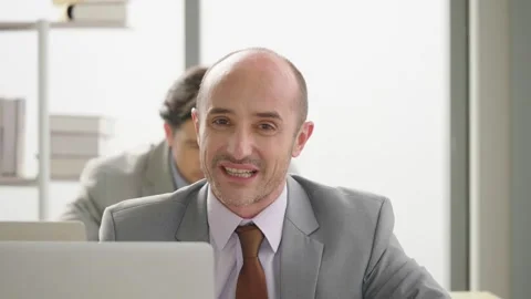 Business man talking to a web camera conference camera  Stock Footage 160265092