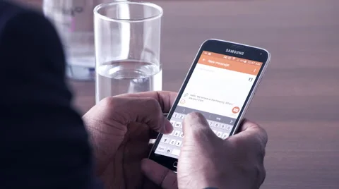 Business man text messaging while in conference room Stock Footage 59379570