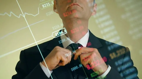 Business Man Thinking in Visual Stock Market Index Screen While Touching his Tie Vidéo 87671492