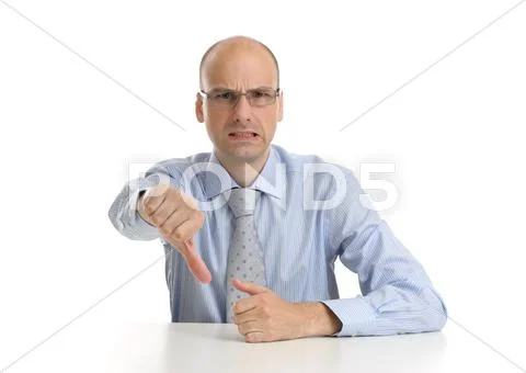 Business man with thumbs down over white Stock Photos