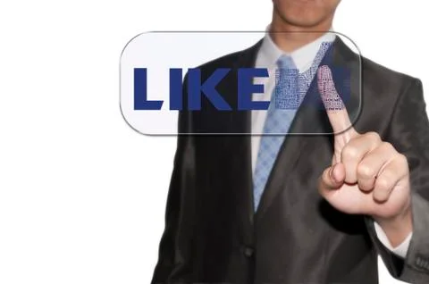 Business man touching the like button Stock Photos