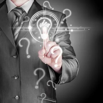 Business man touching light of idea Stock Illustration