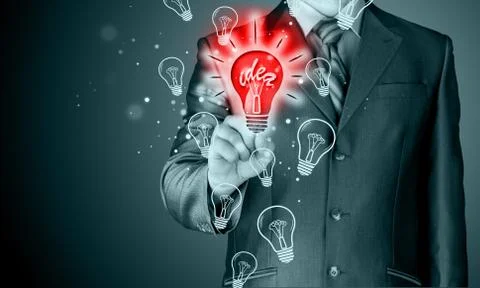 Business man touching light of idea Stock Illustration