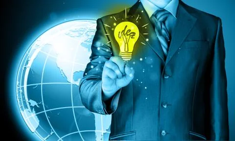Business man touching light of idea Illustrazione stock