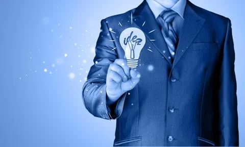 Business man touching light of idea Stock-Illustration