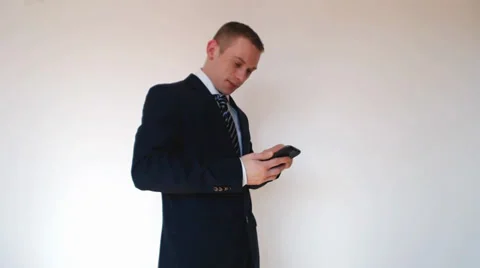 Business man touching smartphone Stock Footage 36770411