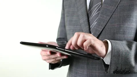 Business man touching tablet pc sensitive screen 스톡 동영상 21243176