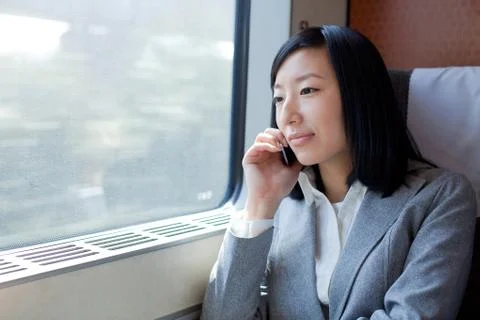 A business man on a train Stock Photos