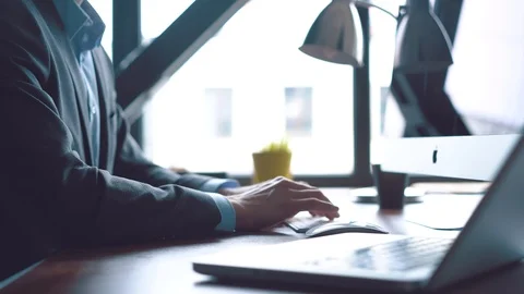 Business man typing on computer keyboard in office Stock Footage 123916360