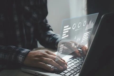 Business man typing computer keyboard screen digital icon graph and chart. .. Stock Photos