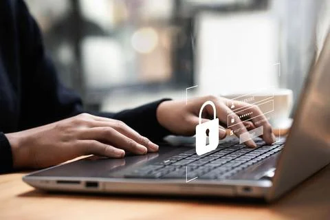 Business man typing on computer keyboard cybersecurity and privacy concept .. Stock Photos