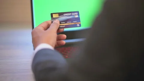 The business man is typing data on a laptop on the desk Stock Footage 137516231