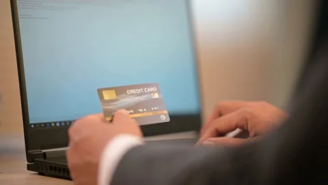 The business man is typing data on a laptop on the desk Stock Footage 137516395
