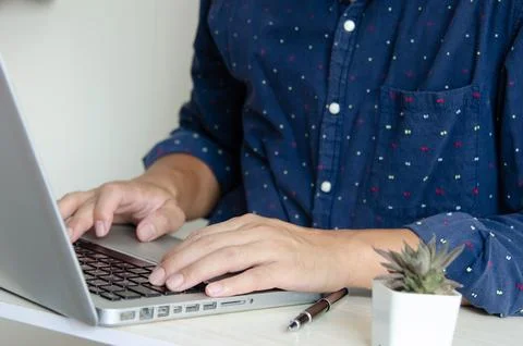 Business man typing on keyboard computer laptop. Stock Photos