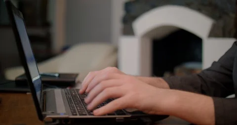 Business man typing on laptop computer Stock Footage 87324078