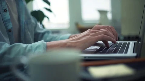 Business man typing message using laptop at home Video stock 82930860