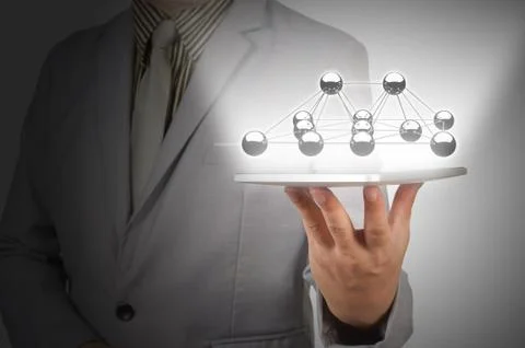 Business Man use Digital Computer Tablet present Network or Molecular Stock Photos