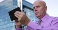 Business Man Use Digital Tablet Bad Mood Sad News Stock Market Down Low Profits 4k or 4k+ Resolution