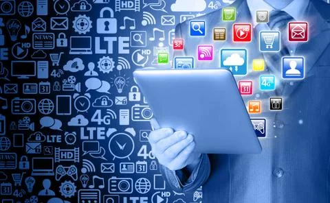 Business man use tablet pc with colorful application icons Illustrazione stock