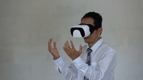 Business man using AR technology. Man be action in your imaging. Stock Footage 91332133