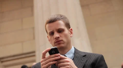 Business Man Using Cell Phone on Steps Vídeos de archivo 22769867