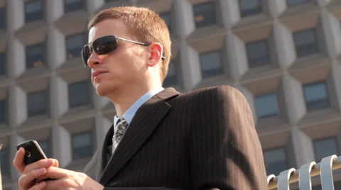 Business  Man Using Cellphone in City Vidéo 22769764