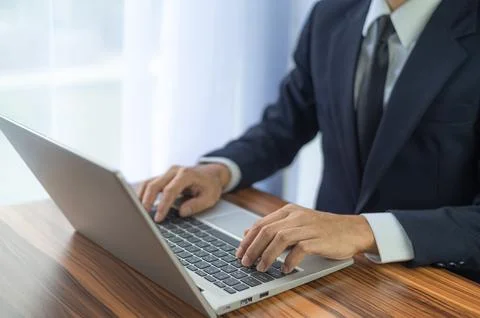 Business man using computer working in office Stock Photos