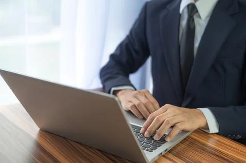 Business man using computer working in office Stock Photos