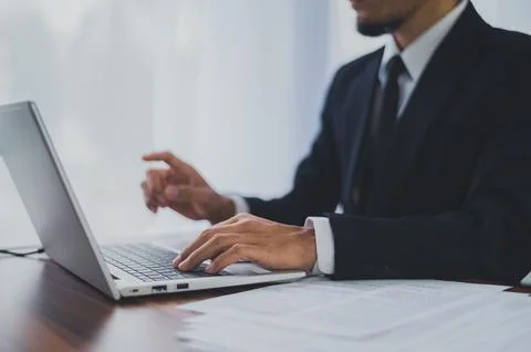 Business man using computer working in office Stock Photos