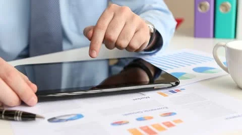 Business man using digital tablet and drinking Stock Footage 22008655