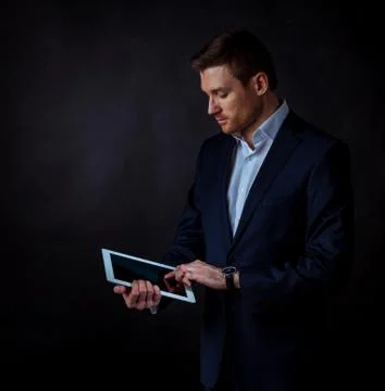 Business man using digital tablet Stock Photos