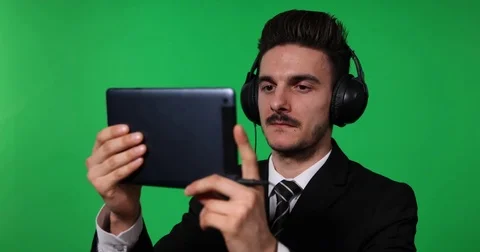 Business Man Using Headphone Digital Tablet Big Laughing Green Screen Background Stock Footage 77000072
