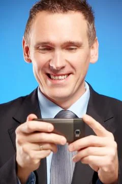 Business man using his mobile phone Stock Photos