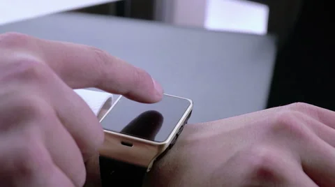 Business man using his smartwatch app in the office Video stock 63521072