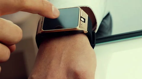 Business man using his smartwatch app in the office Stock Footage 68568201